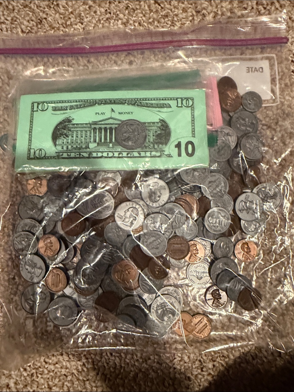 Clear Ziploc Bag Filled with Assorted Coins and Play Money